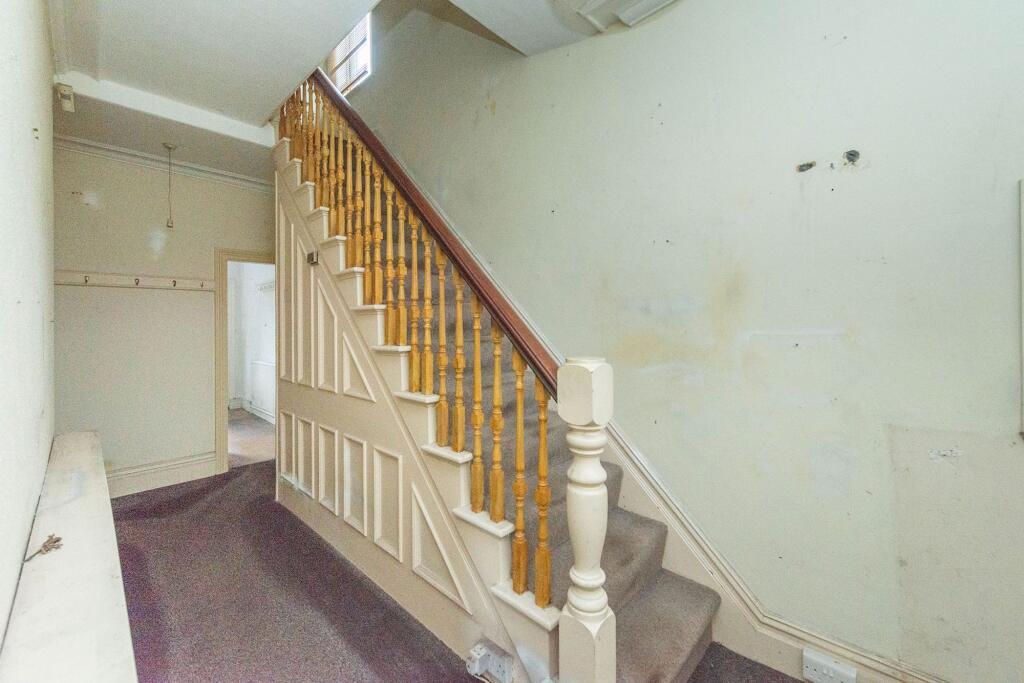 ENTRANCE HALLWAY AND LANDING