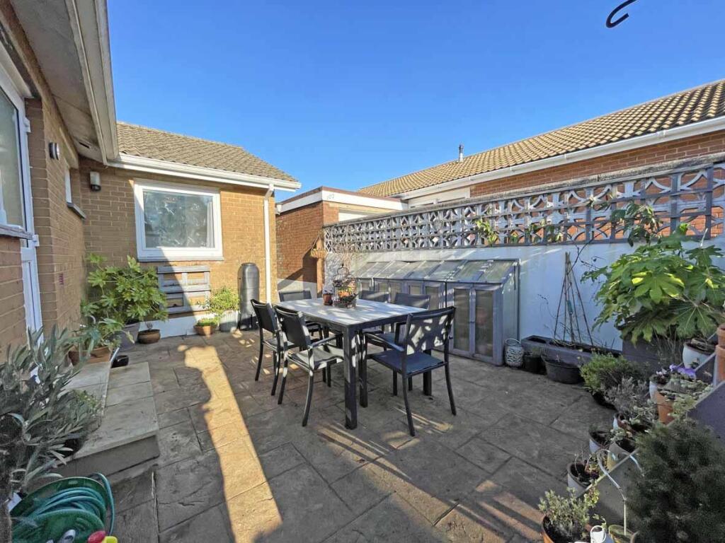 Upland Drive 104 Side Garden.jpg