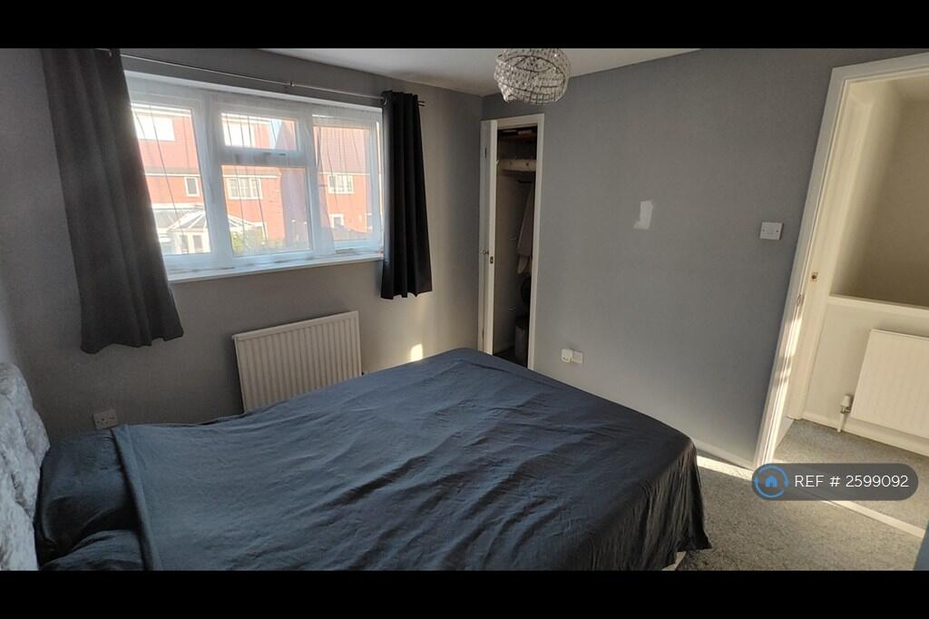 Primary Bedroom (Double) &amp; Built-In Cupboard