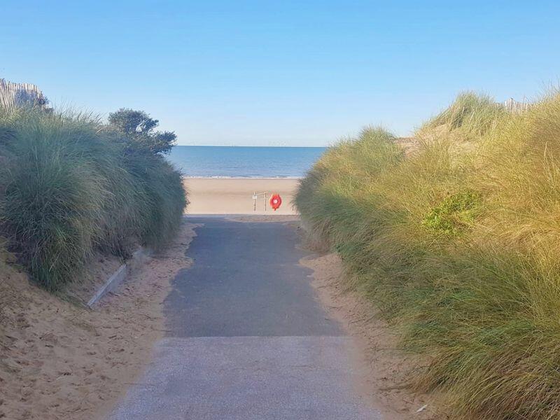 Walkway To The Seaside Promenade
