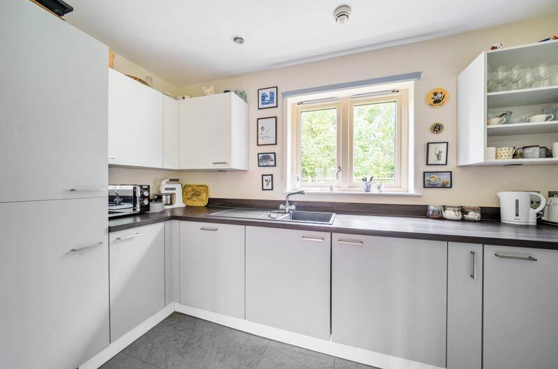 Kitchen with built-in appliances