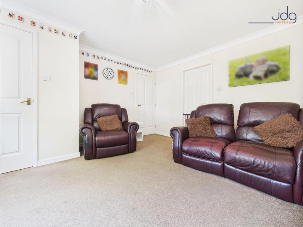 Cosy Lounge and under stairs storage