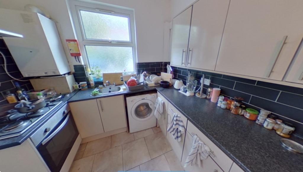 A bright and functional kitchen featuring moder...