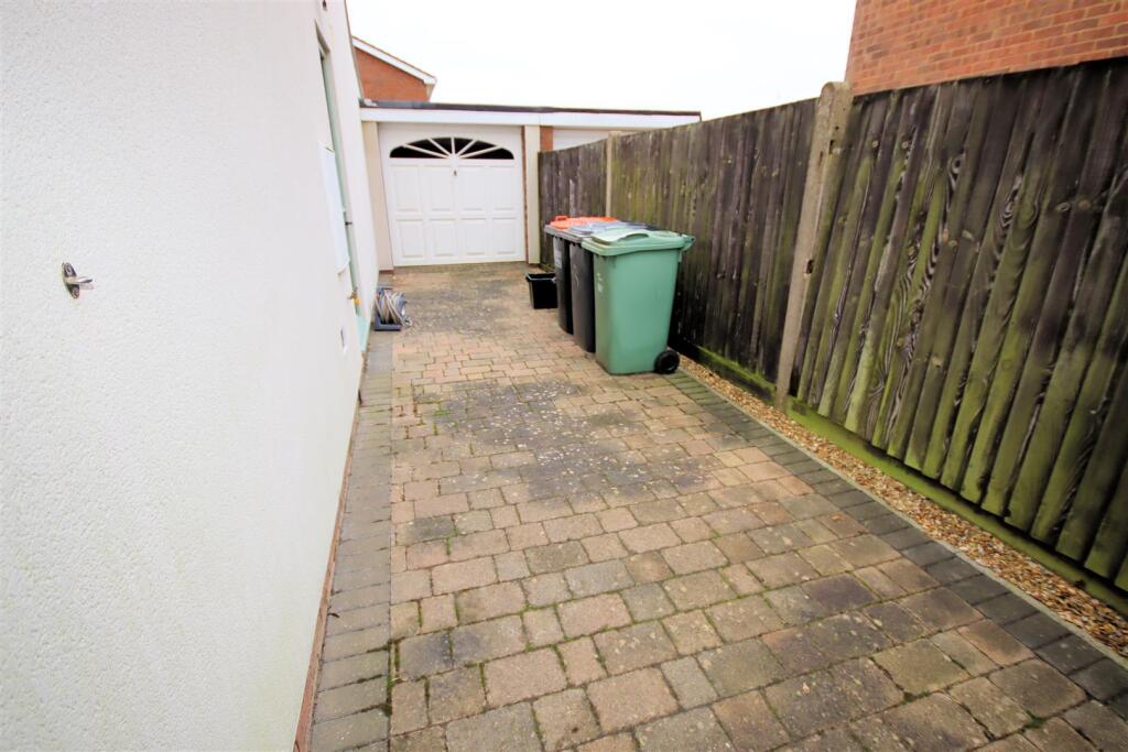 Side Drive Leading to Garage