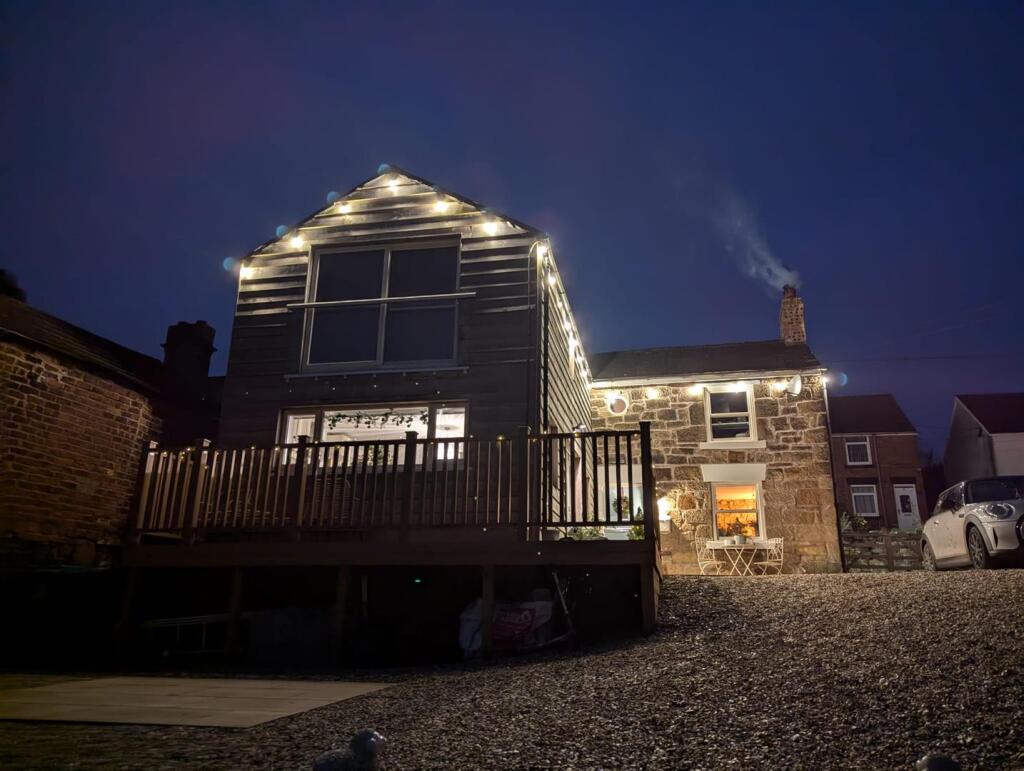 FRONT ASPECT AT TWILIGHT