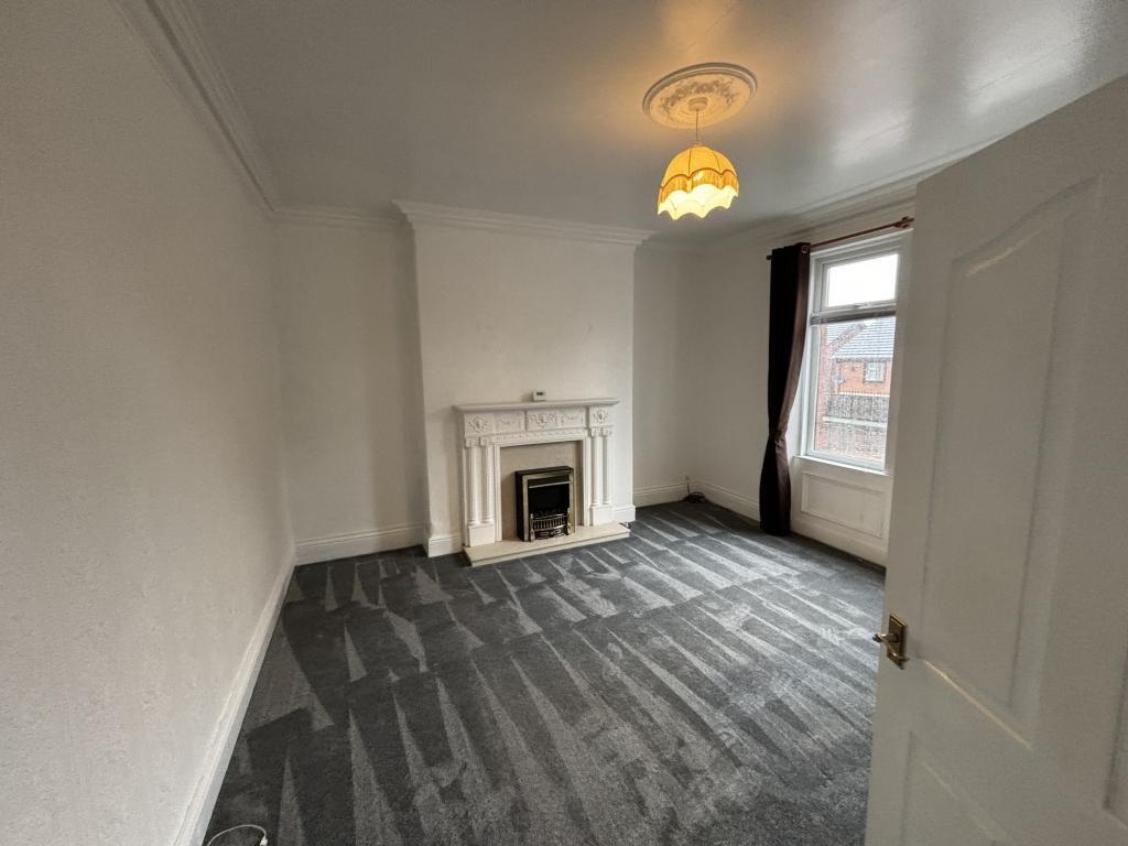 Bright and spacious master bedroom featuring a ...