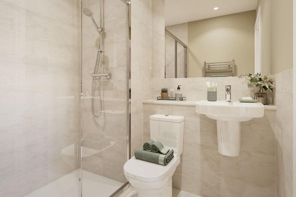 An en suite shower room with high quality fixtures and fittings
