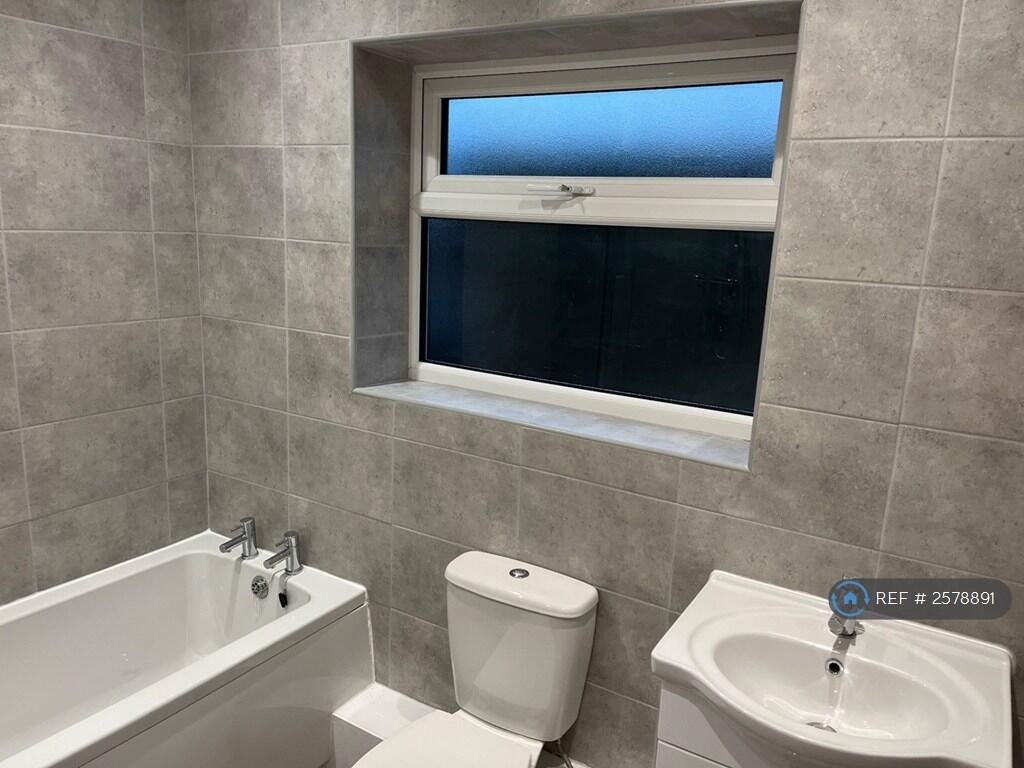 Fully Tiled Upstairs Bathroom