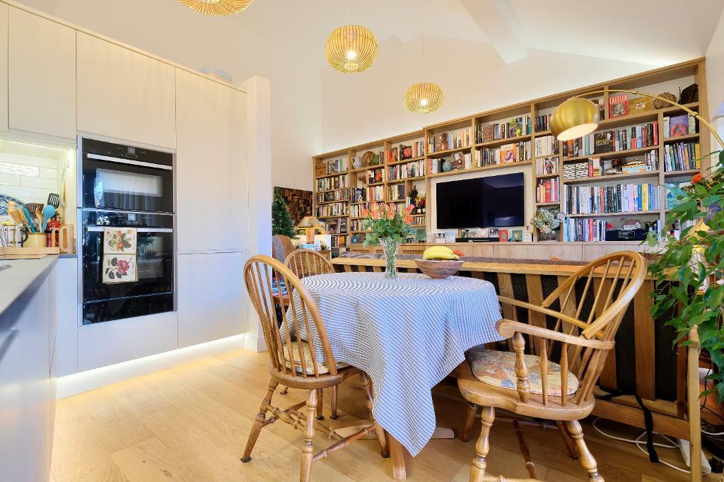 Wall of fitted bookshelves
