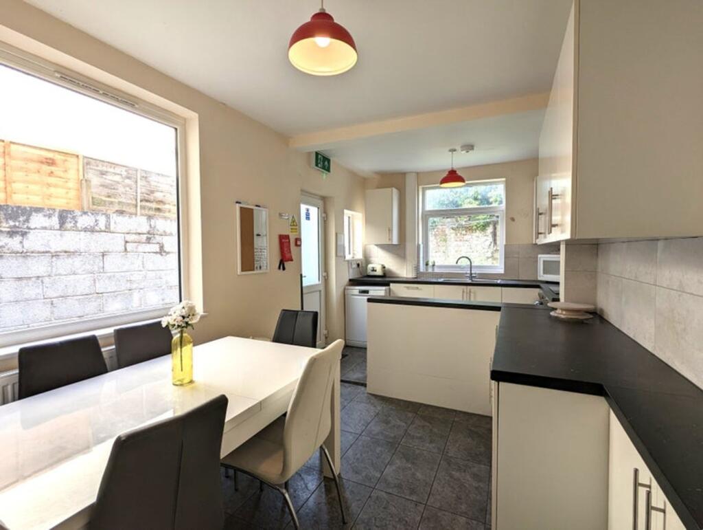 Bright and spacious kitchen featuring modern ap...