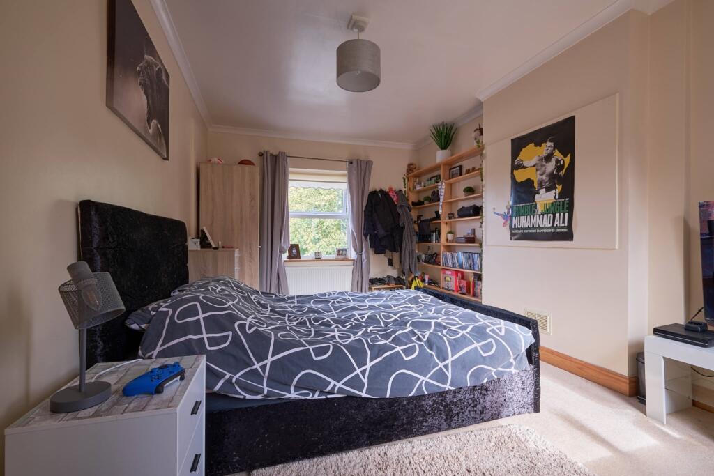 The ample space in Bedroom 3 offers versatility al