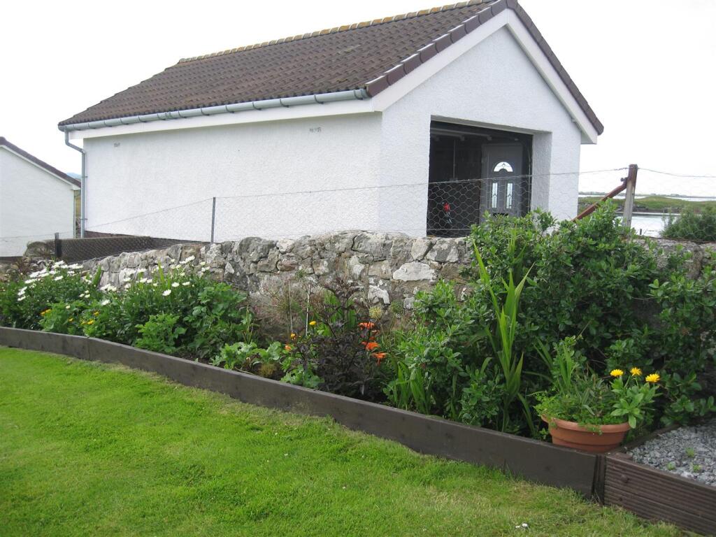 Garage and flowers.JPG
