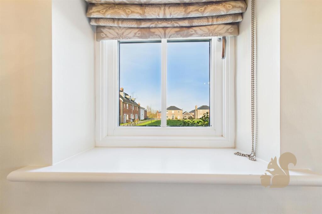 View Out To Side Of Property From Living Room