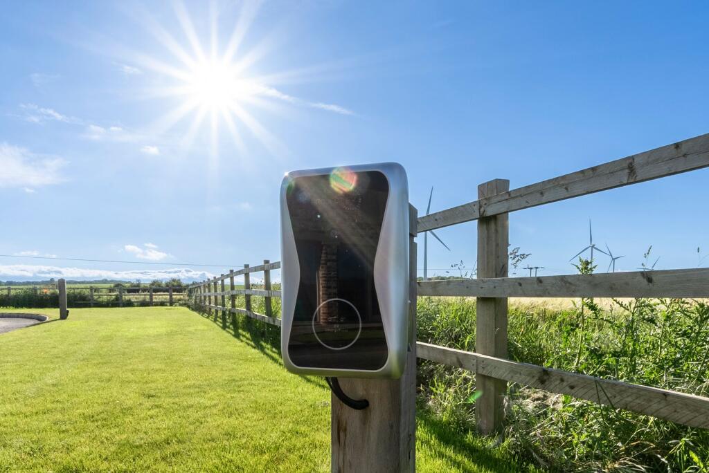 EV Charger at each property