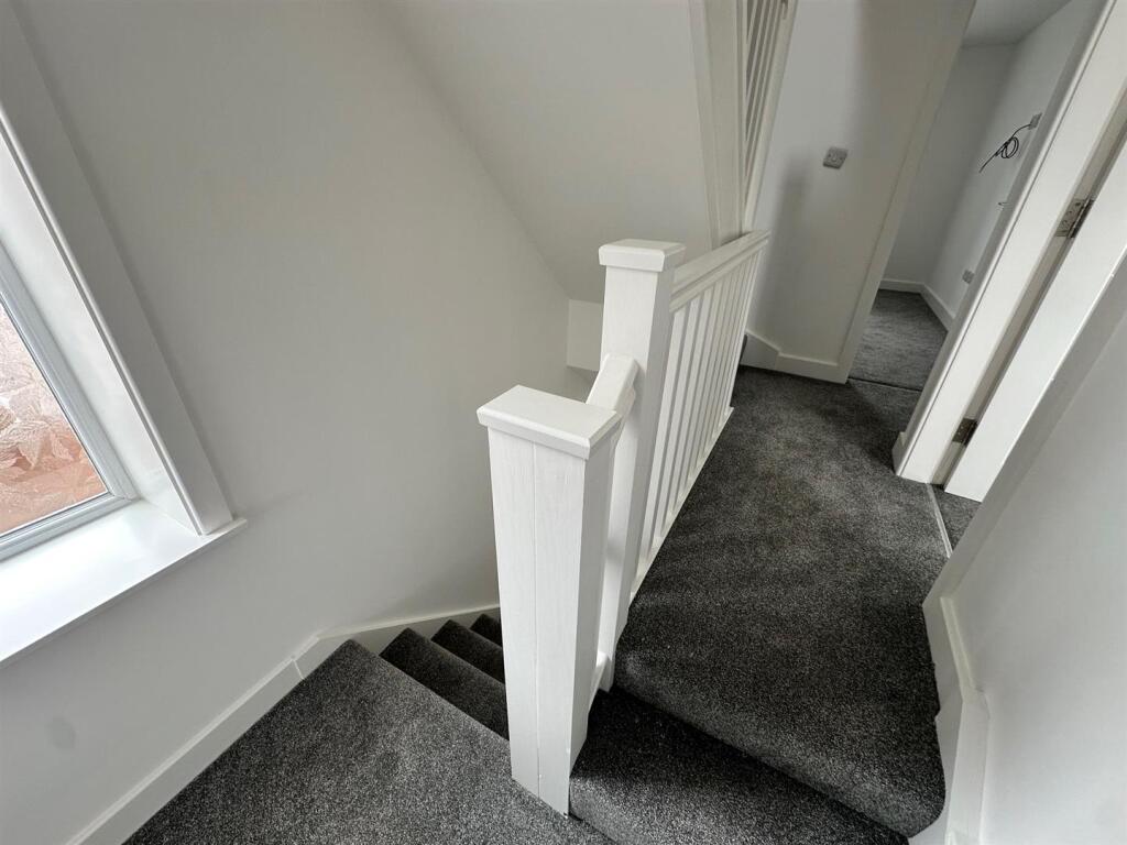 Landing to first floor