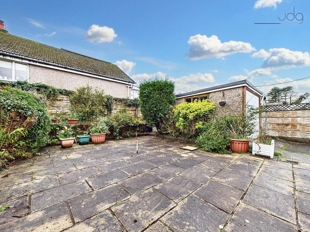 Rear Flagged Garden with Garage