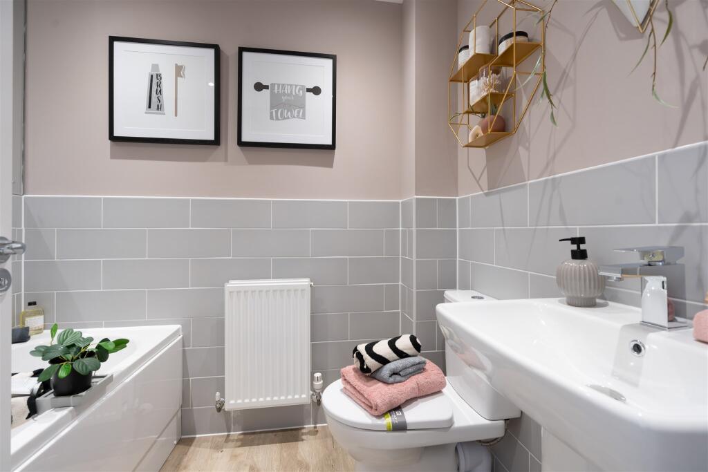 Inside view of the Alderney family bathroom. 4 bed home.