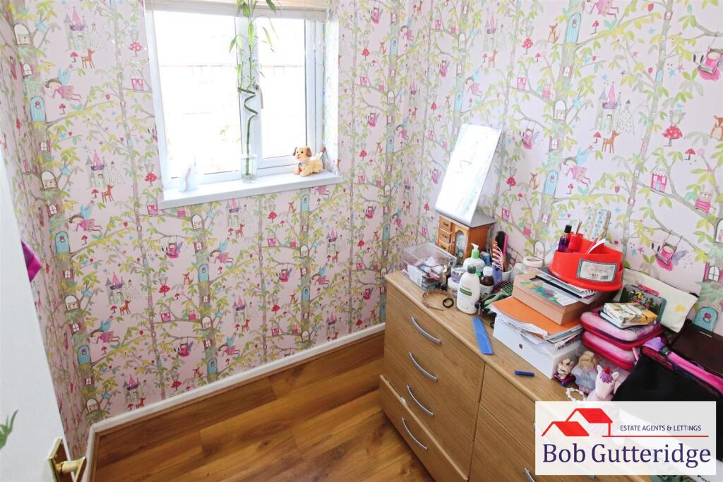 BEDROOM FIVE (REAR)