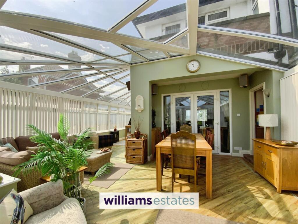 wrap around conservatory
