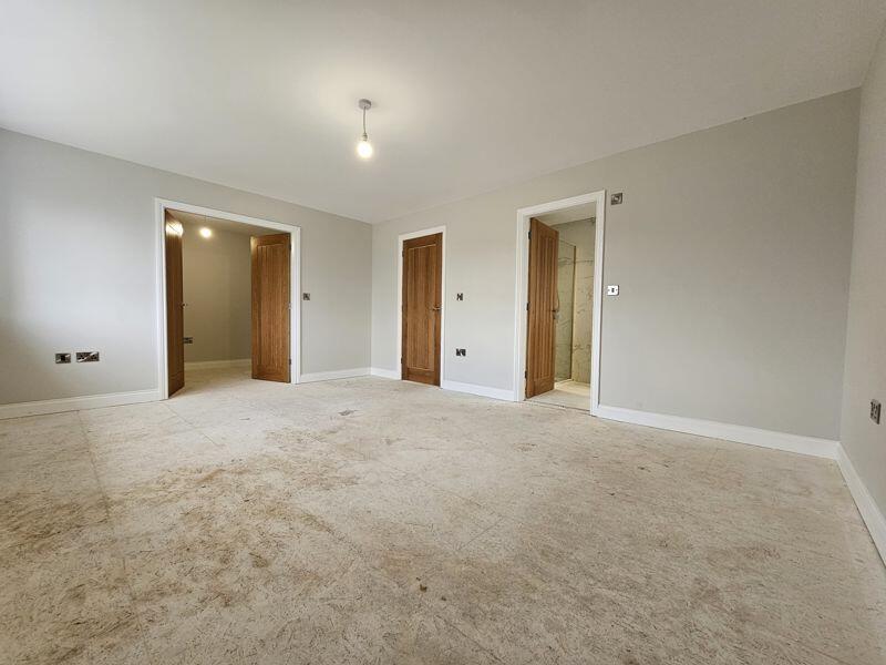 Bedroom One into Dressing Room