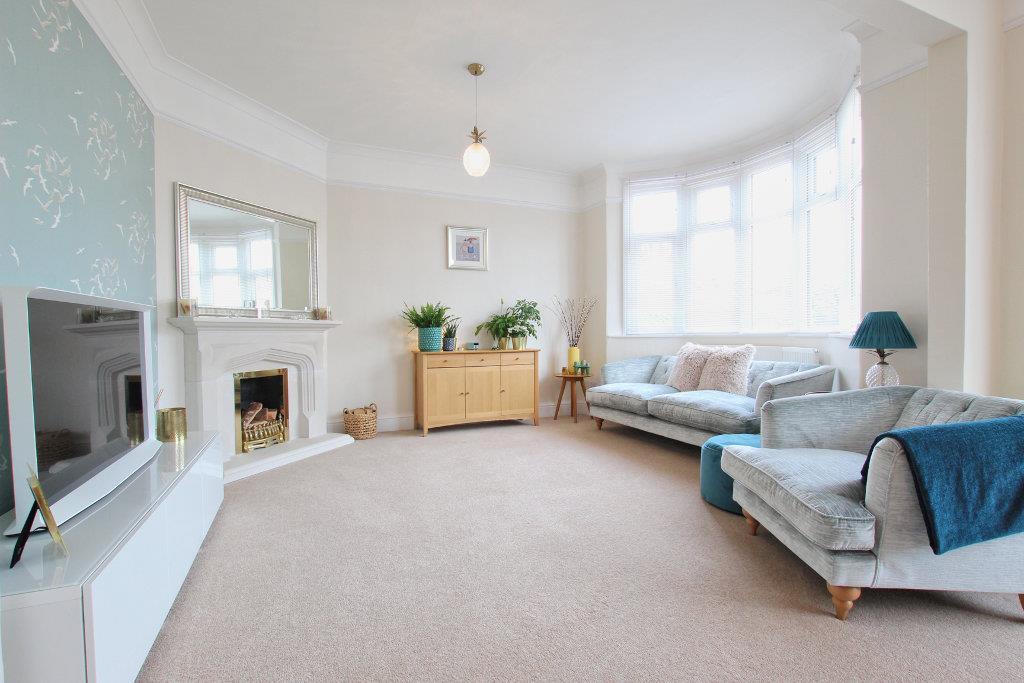 THROUGH LOUNGE AND DINING ROOM
