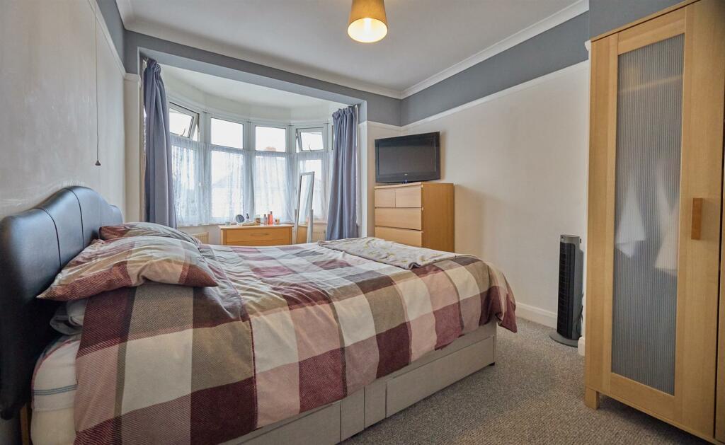 FRONT BEDROOM ONE