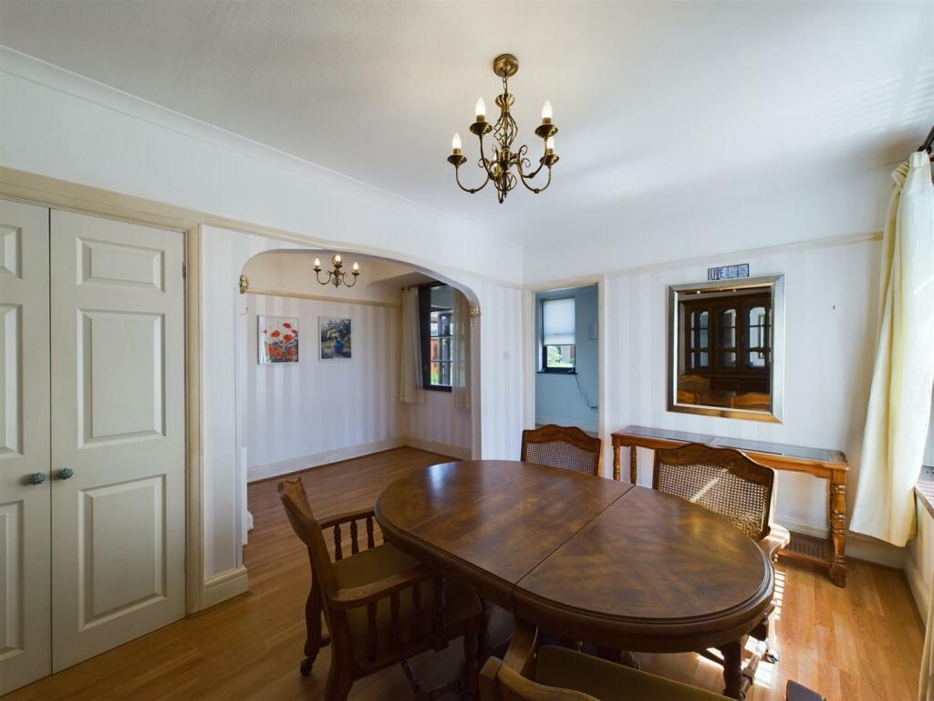 Dining room and kitchen.