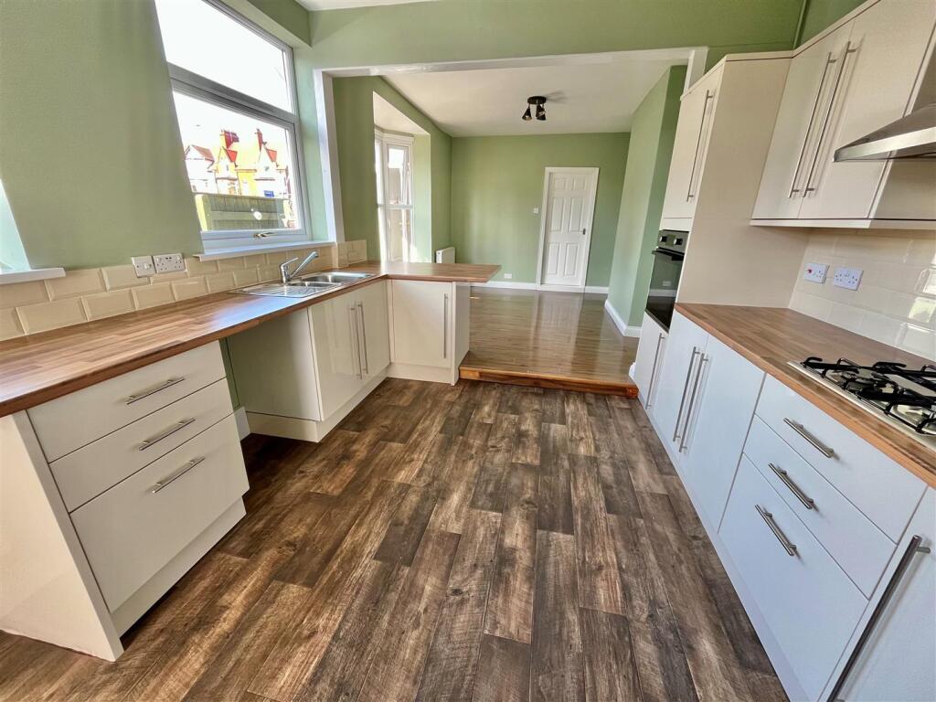 Kitchen into Breakfast Area.jpg