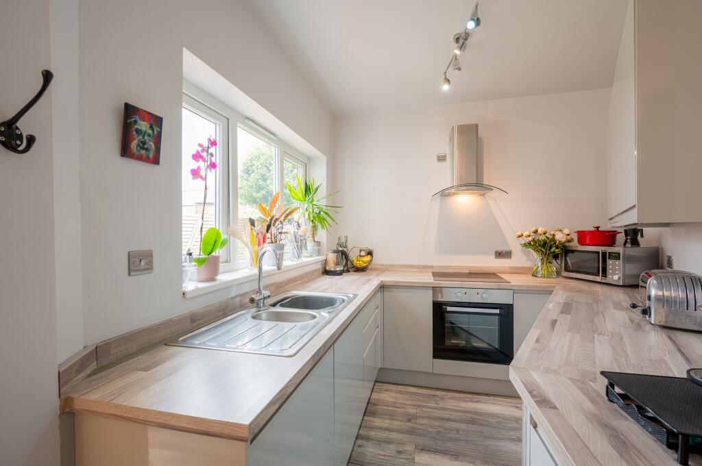 SITTING ROOM DINING ROOM AND KITCHEN