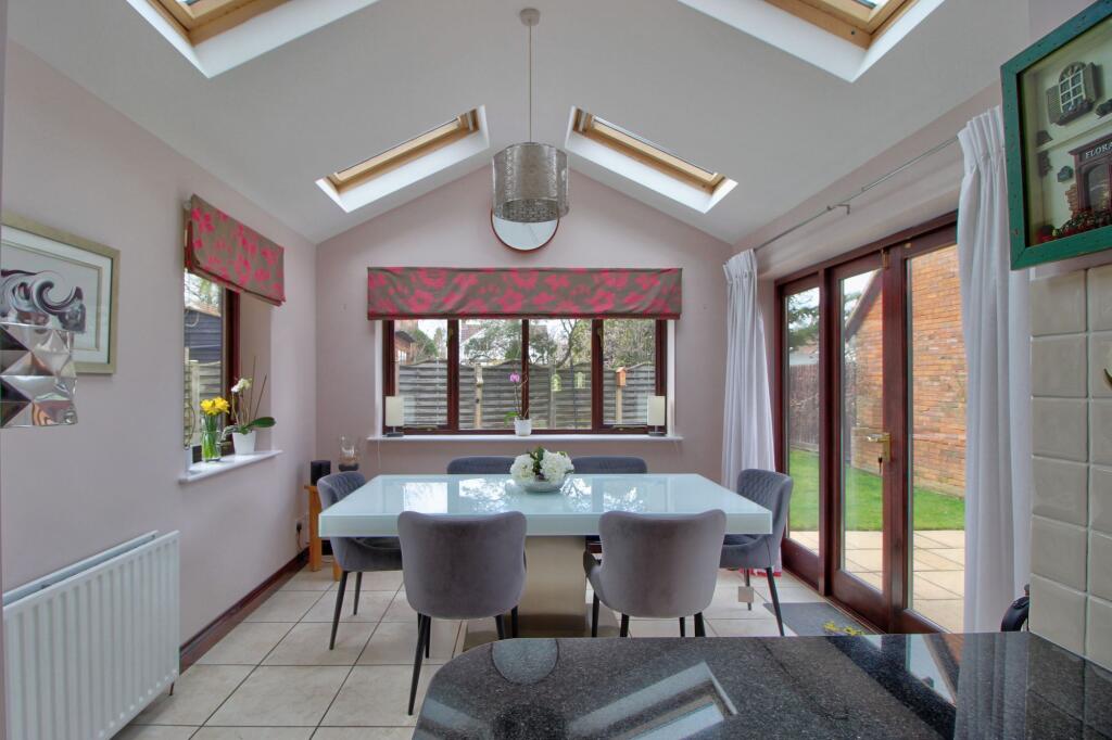 Dining Room with vaulted ceiling
