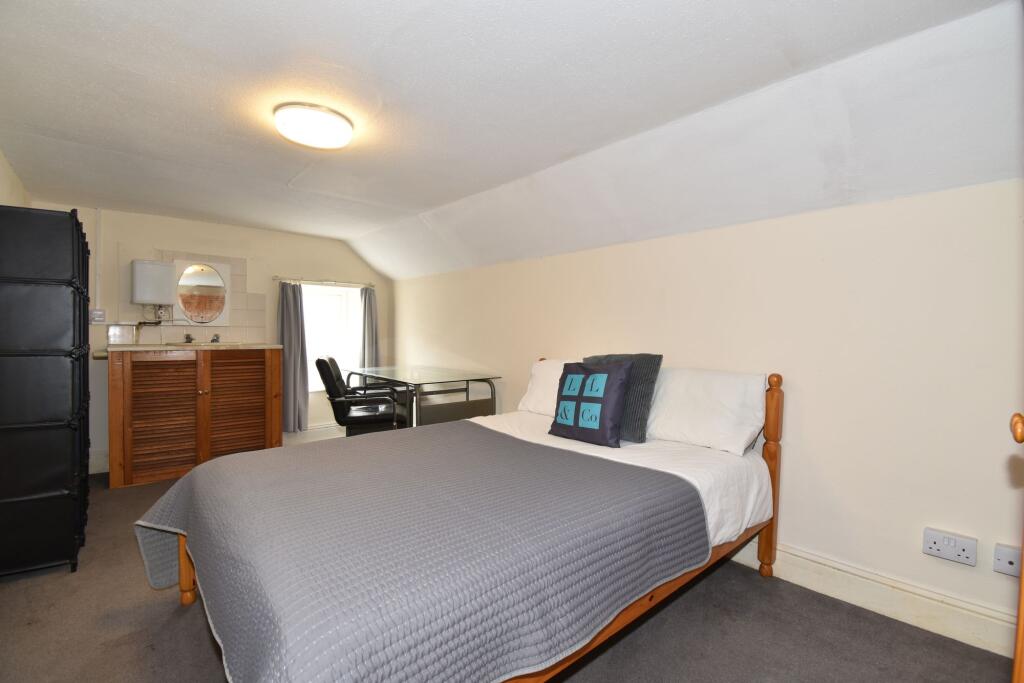 Top floor flat (bedroom)