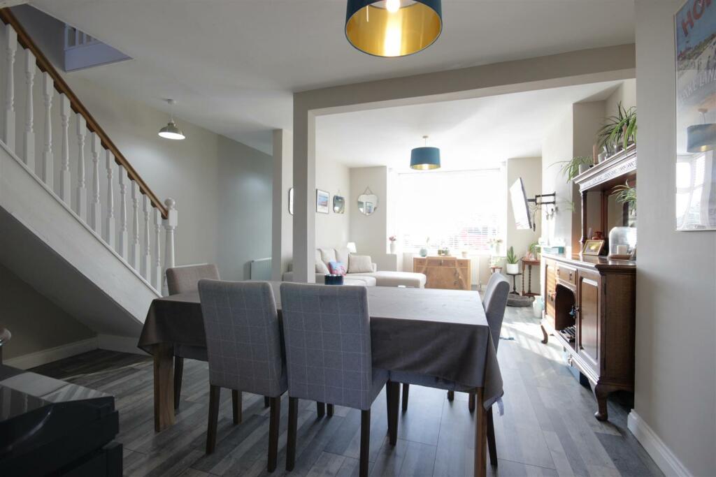 THROUGH LOUNGE AND DINING ROOM