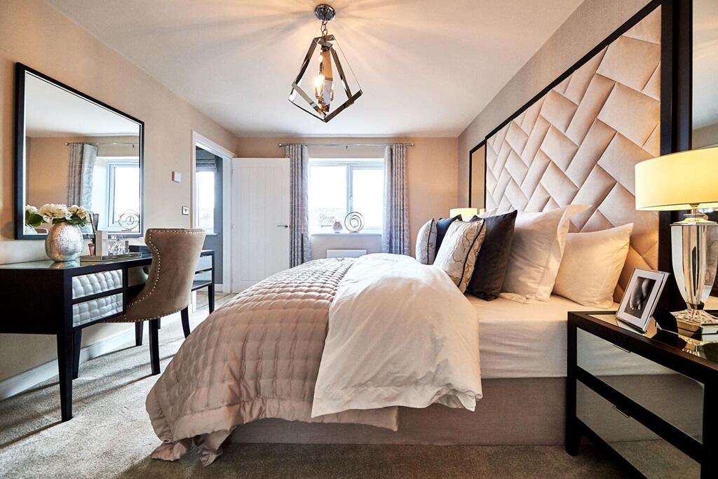 King-size bedroom with space for a dressing table and wardrobes