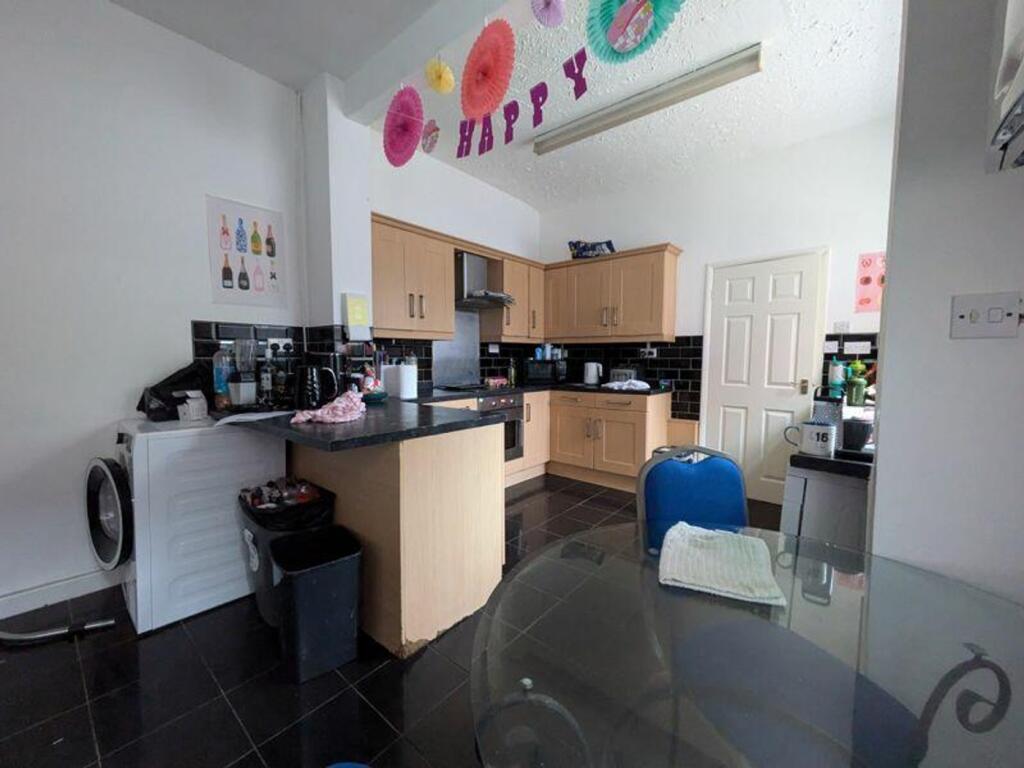 A bright and spacious kitchen with a modern des...