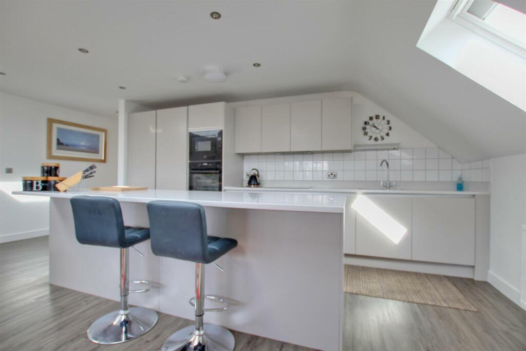 OPEN PLAN KITCHEN AND LIVING AREA