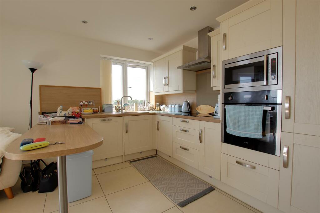 LIVING ROOM WITH KITCHEN AREA