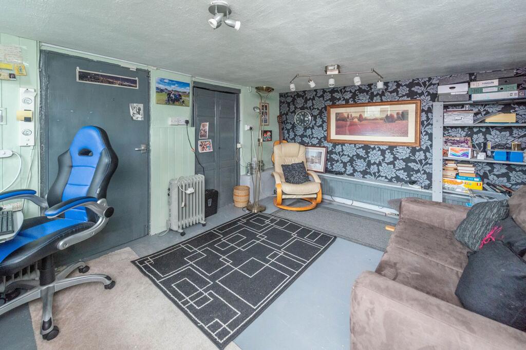 CONVERTED LOWER GROUND FLOOR AND STORE ROOM