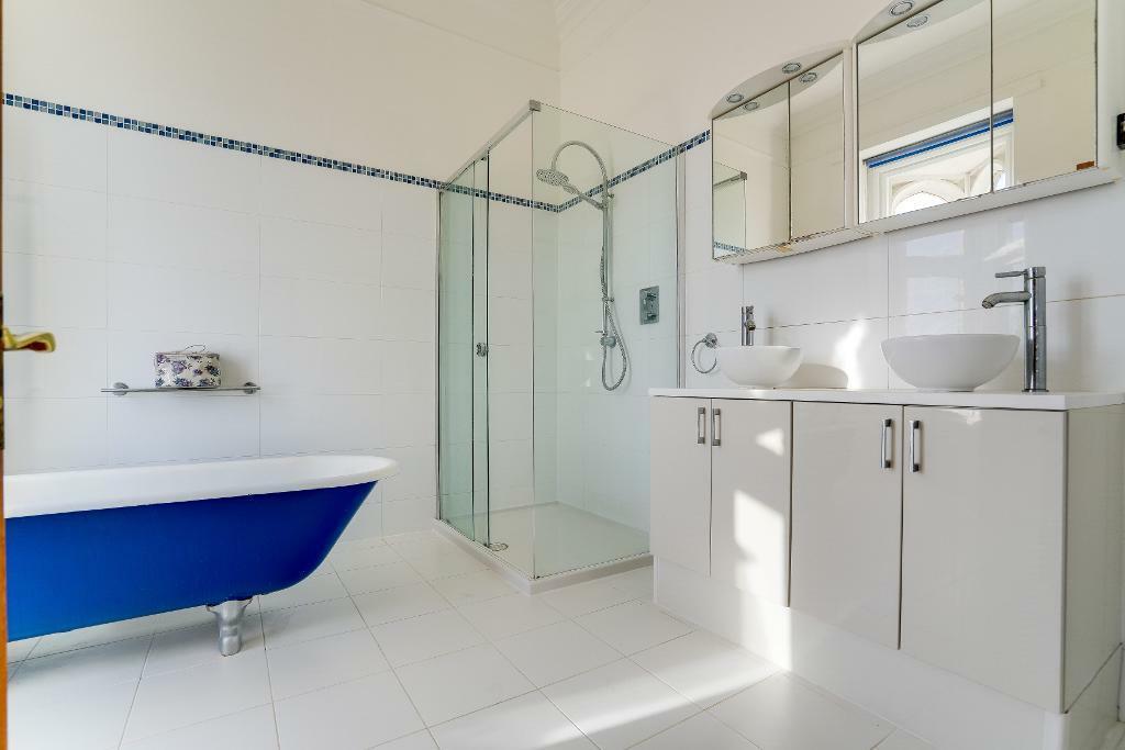 Ensuite to bedroom 1, shower &amp; bath