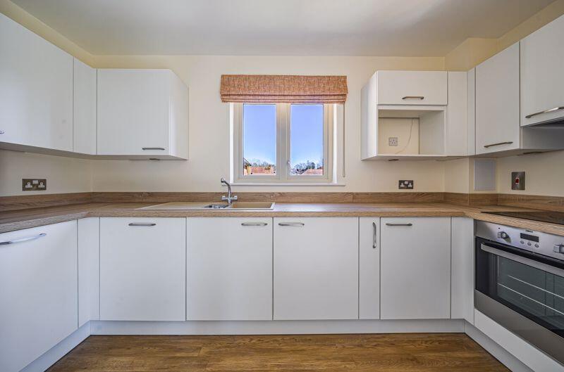 Kitchen with built-in appliances