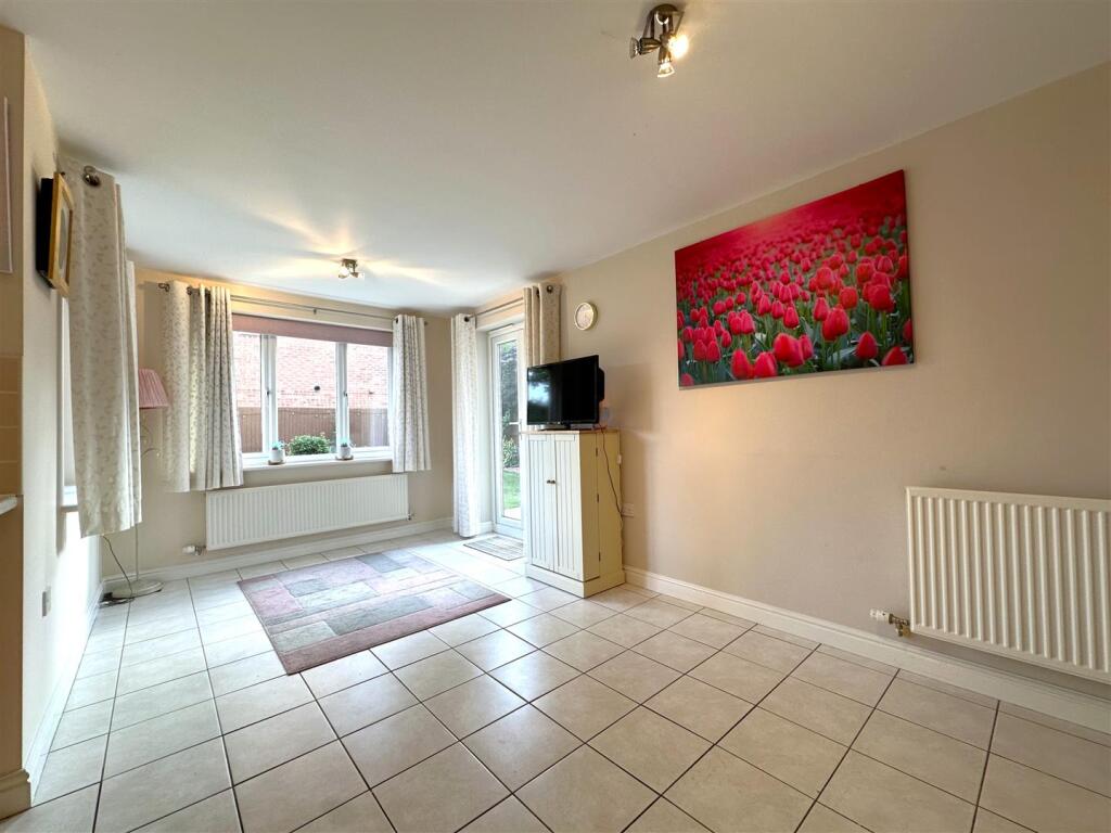 Living/Dining Area With French Doors 323