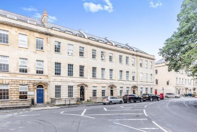 Elegant row of traditional terraced houses on a...