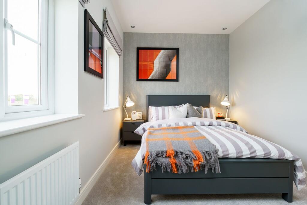 A double bedroom with built in cupboard
