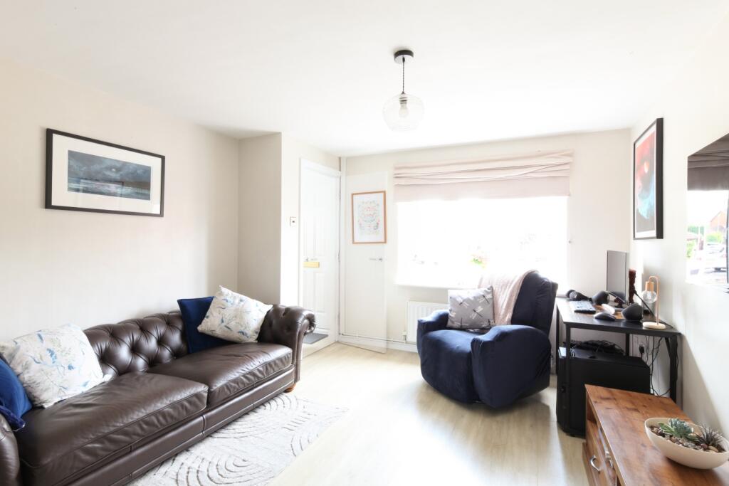 Reception room to front of house