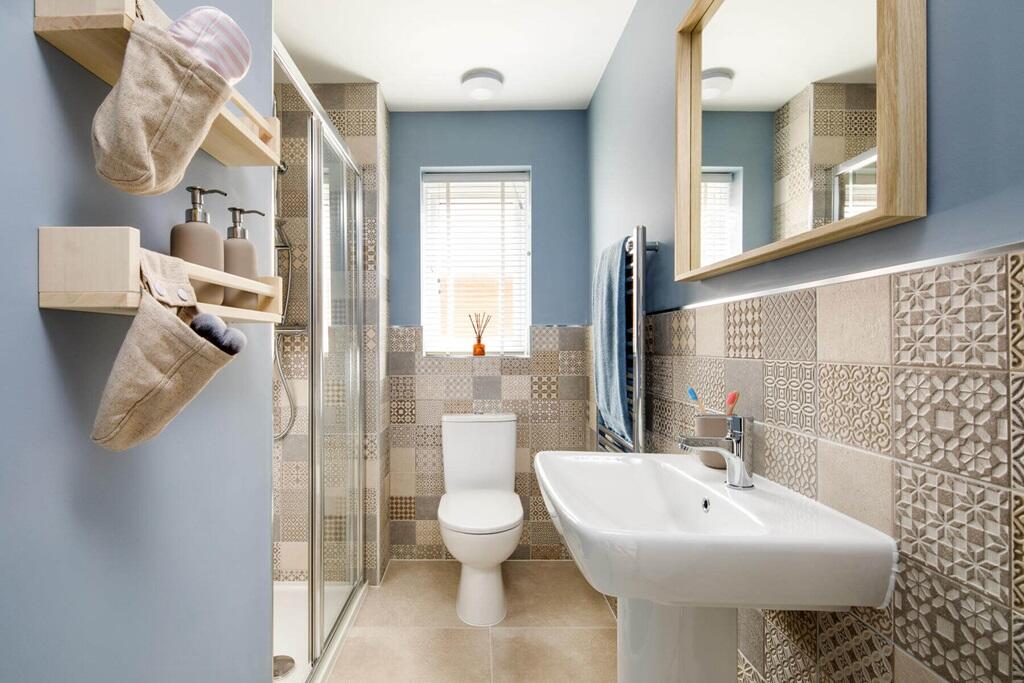 This room also hosts an en-suite, perfect for guests or older children