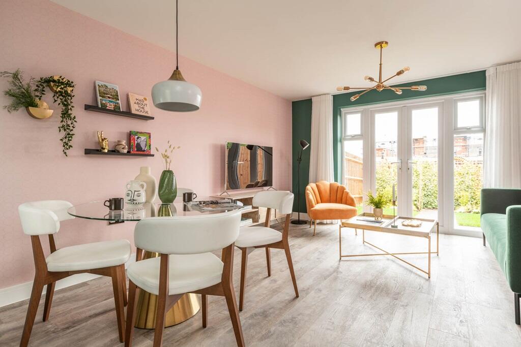 French doors fill the lounge with light, that travels through the home