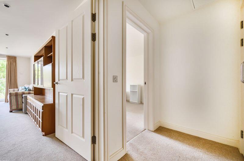 Entrance hall with storage cupboard