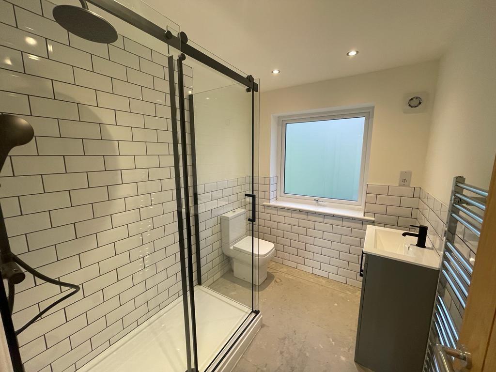EN-SUITE SHOWER ROOM TO BEDROOM ONE