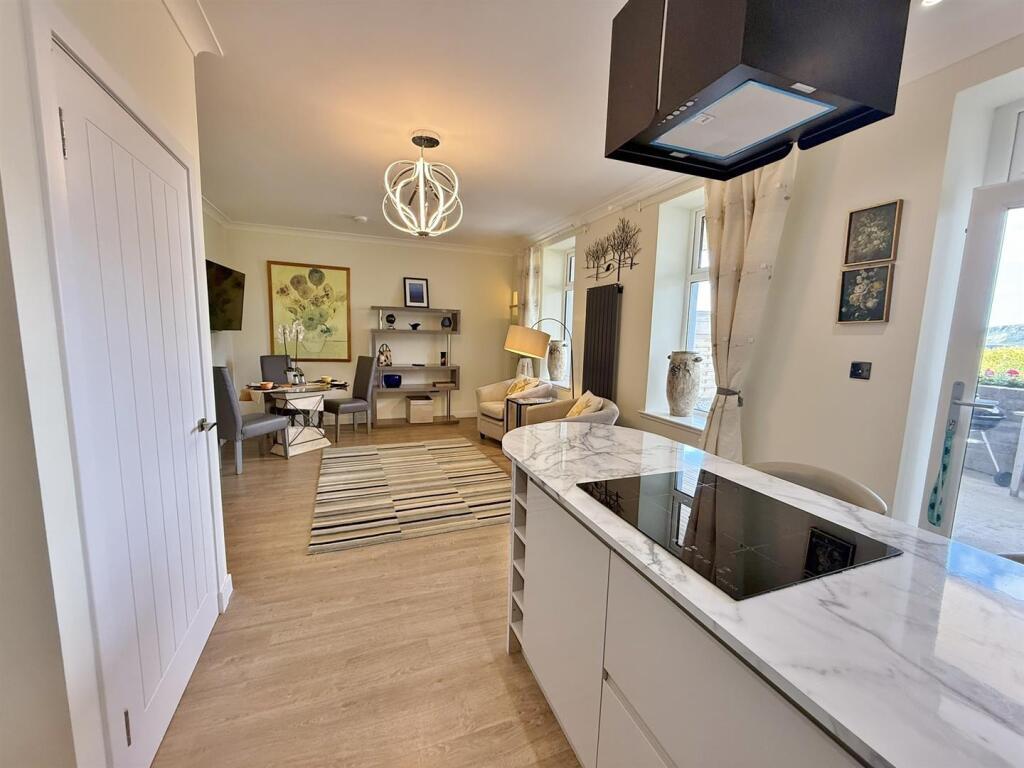 Open plan living room from the kitchen