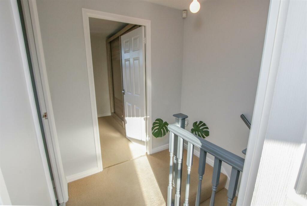 FIRST FLOOR LANDING