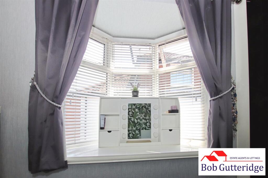 BEDROOM THREE (REAR)